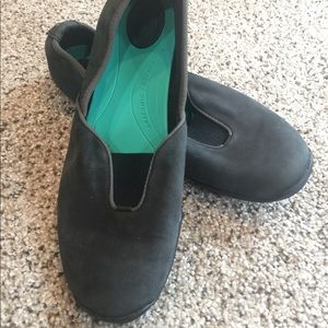 Black slip on Teva shoes